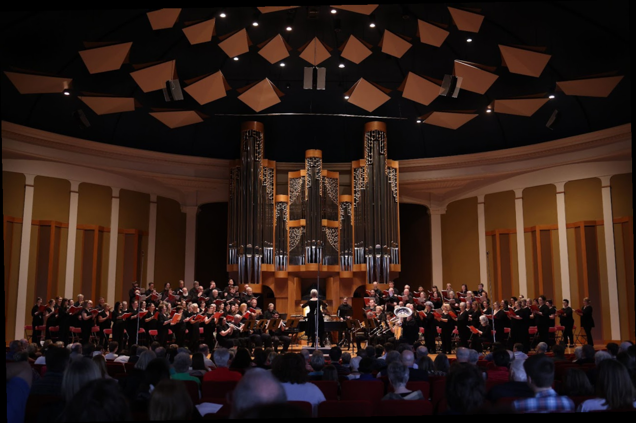 breathtaking image of the gahanna community chorus performing their gloria concert in front of the sweeping organ in ohio wesleyan university